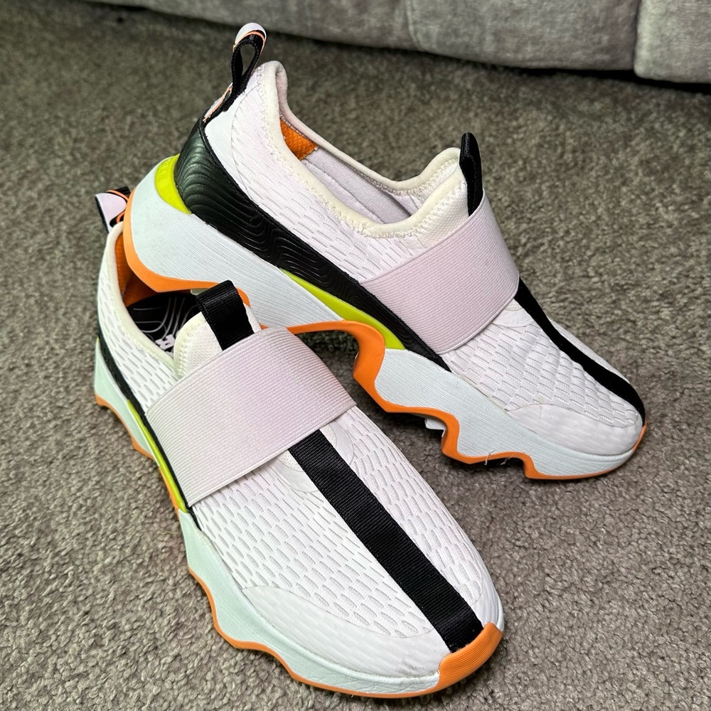 Stylish sorel White and Black Sneakers with Orange Accents